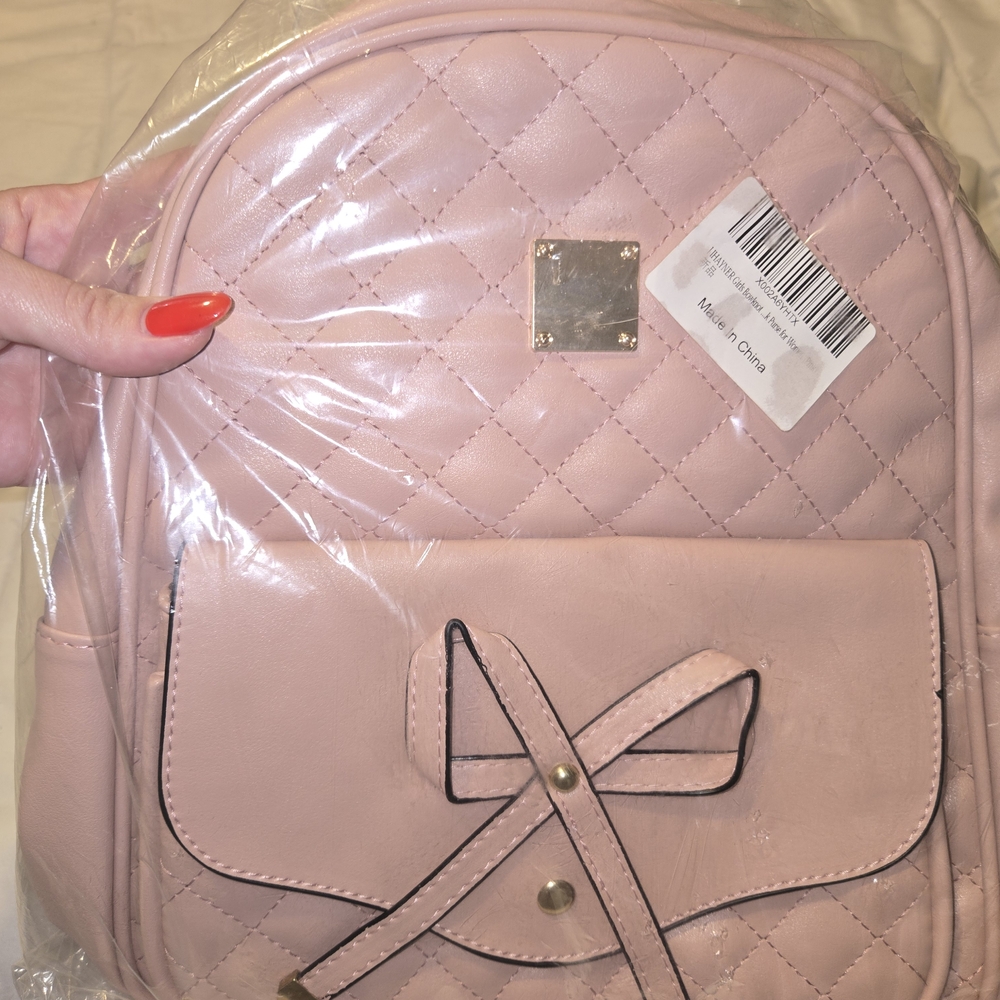 Elegant Pink Quilted Backpack with Bow Accent